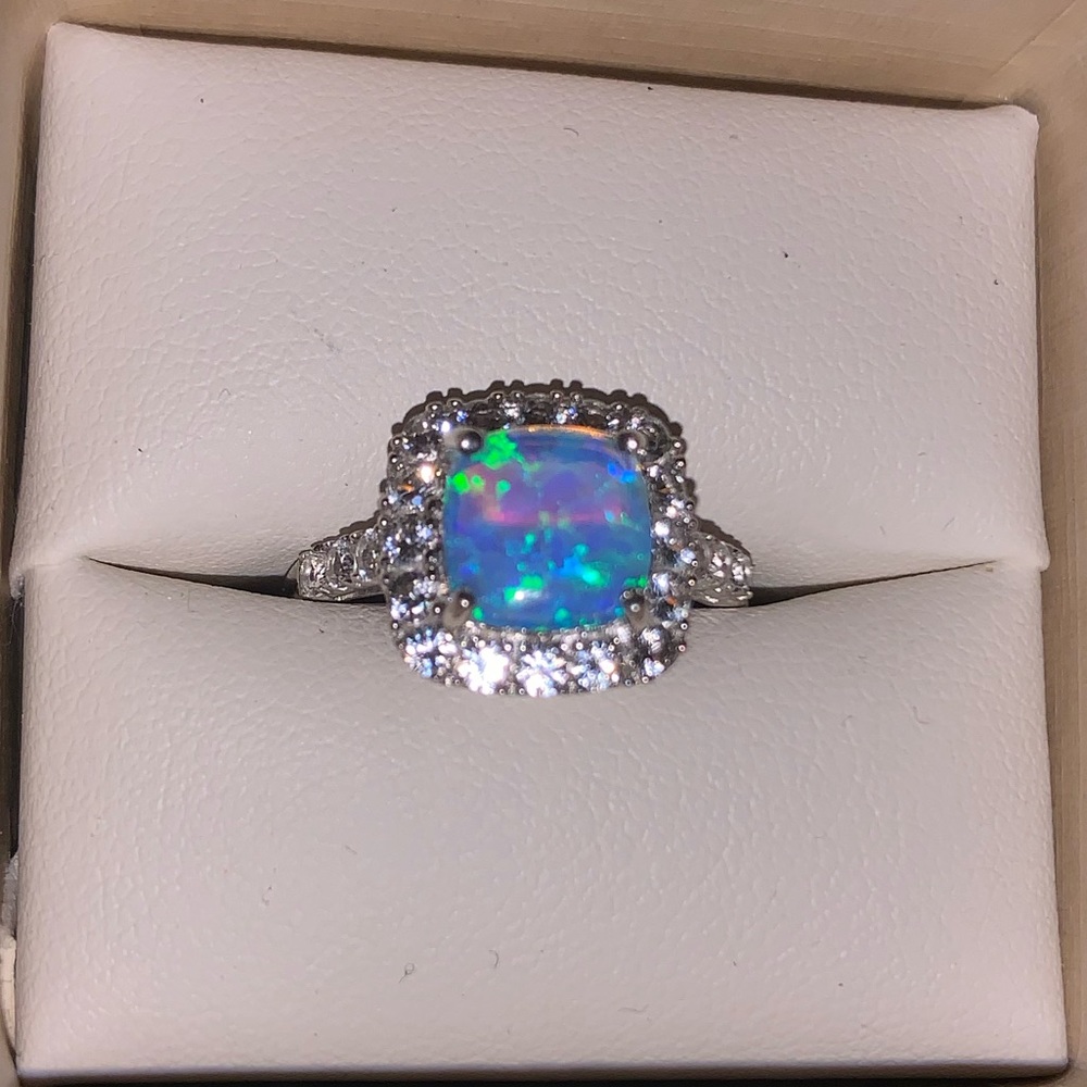 Blue lab created opal ring from reed jewelers